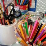 Coloured pens and pencils and other craft equipment