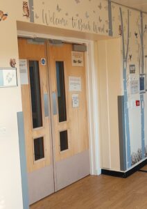 Showing the entrance to the ward with Welcome to Birch Ward above the door