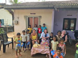 Jayne and villagers she is helping in Sri Lanka