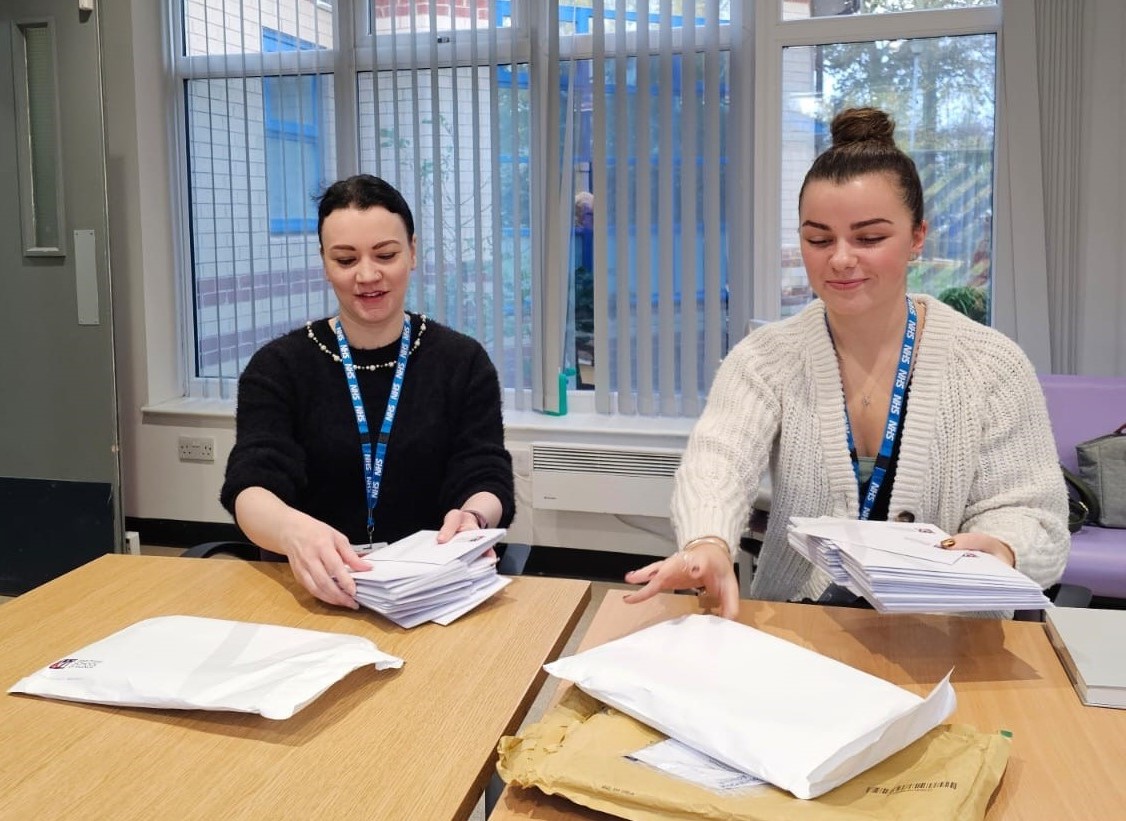 CAMHs staff in Selby opening letter of hope sent from children in Valencia, Spain.